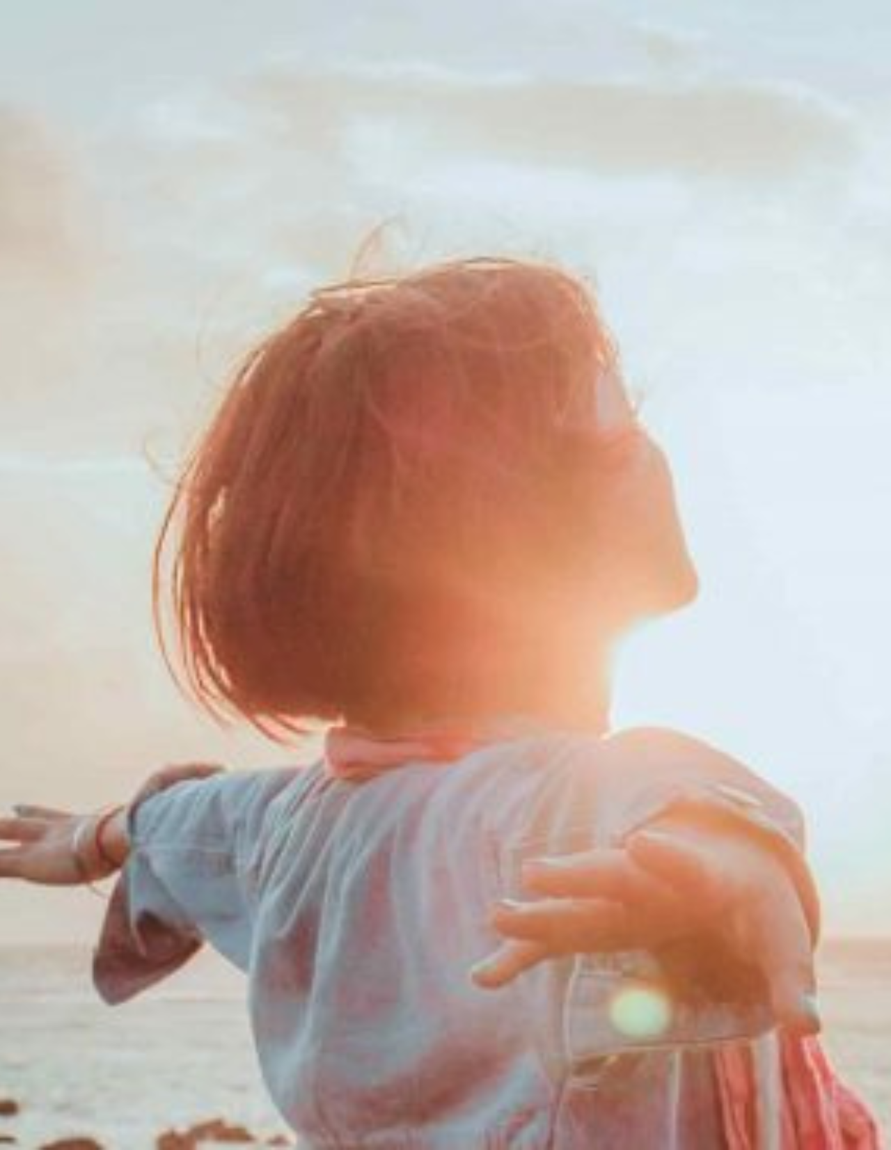 Femme devant le soleil